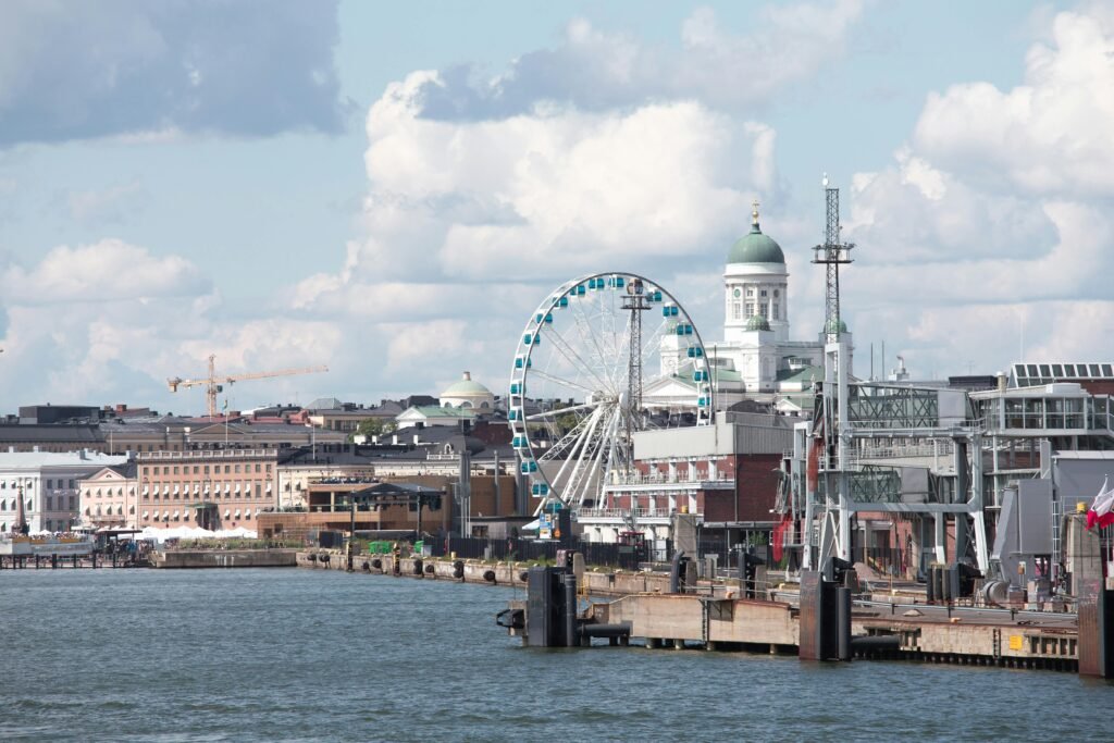 pexels photo 19337103 19337103 Scenic Helsinki waterfront featuring the Sky Wheel and iconic Helsinki Cathedral.